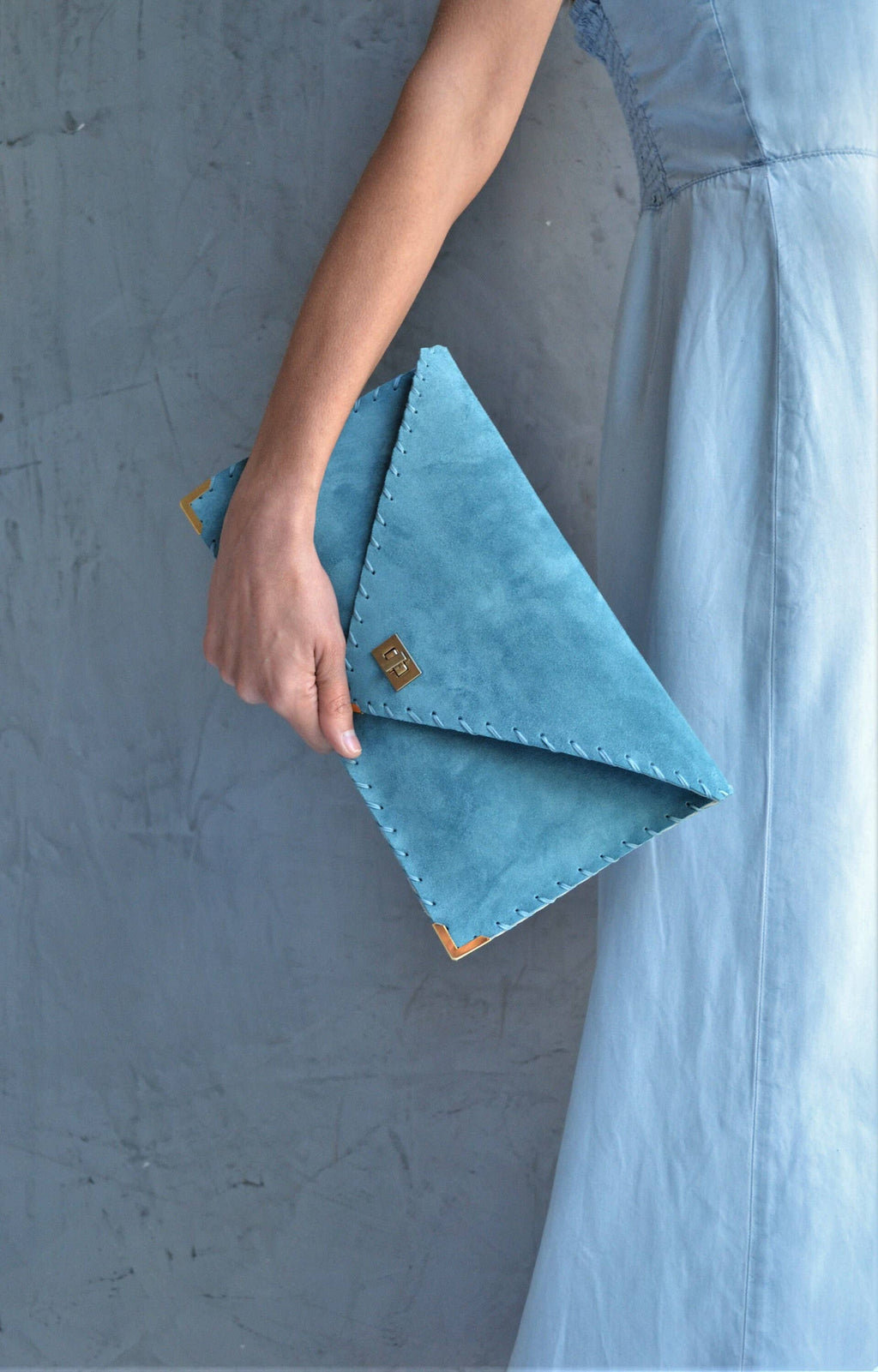 Soft leather clutch in jeans blue