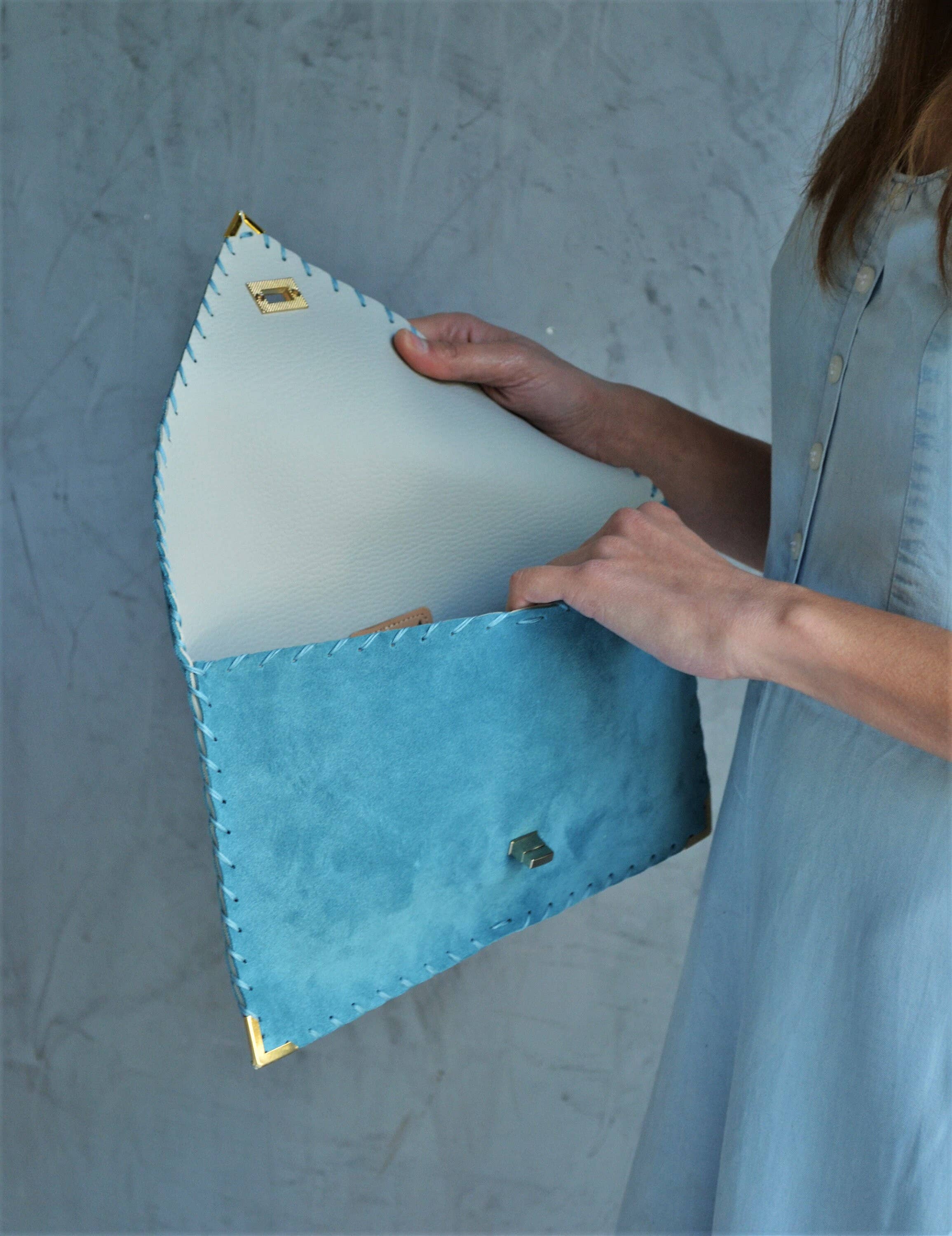 Soft leather clutch in jeans blue
