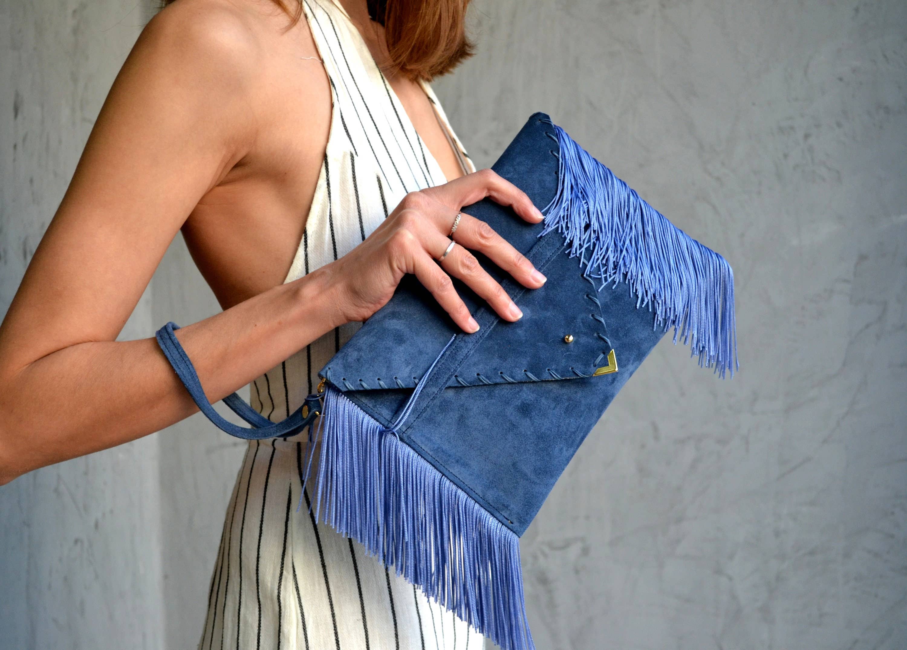 Leather clutch in raf blue with silk fringes