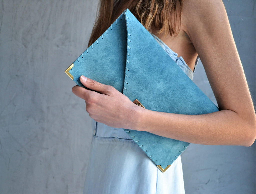 Soft leather clutch in jeans blue