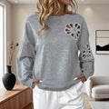 Pearl hollowed-out flower round-neck sweatshirt