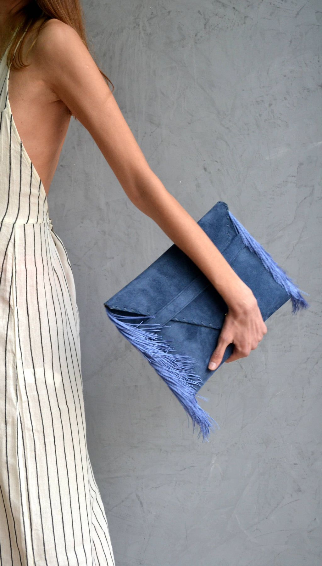 Leather clutch in raf blue with silk fringes