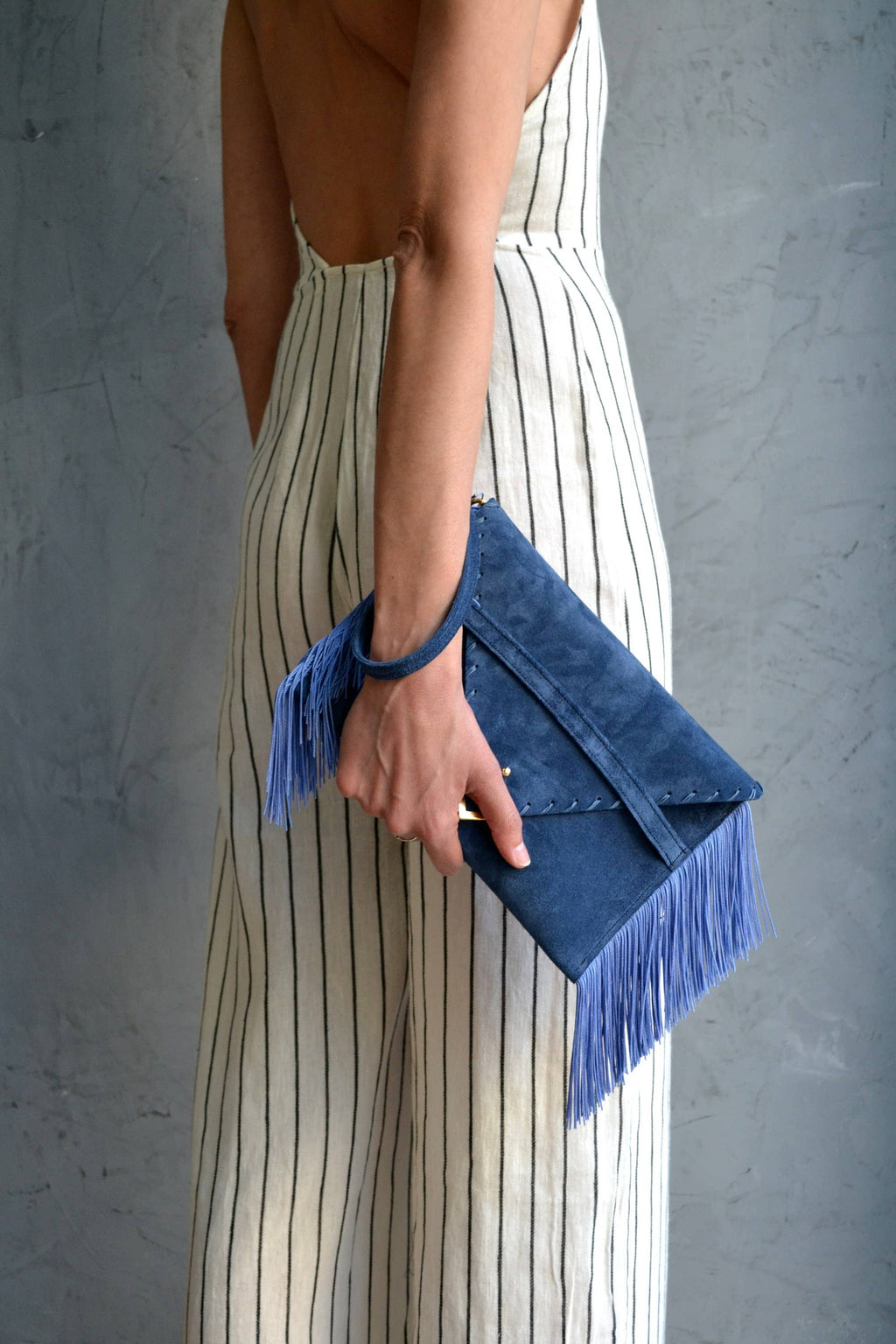 Leather clutch in raf blue with silk fringes