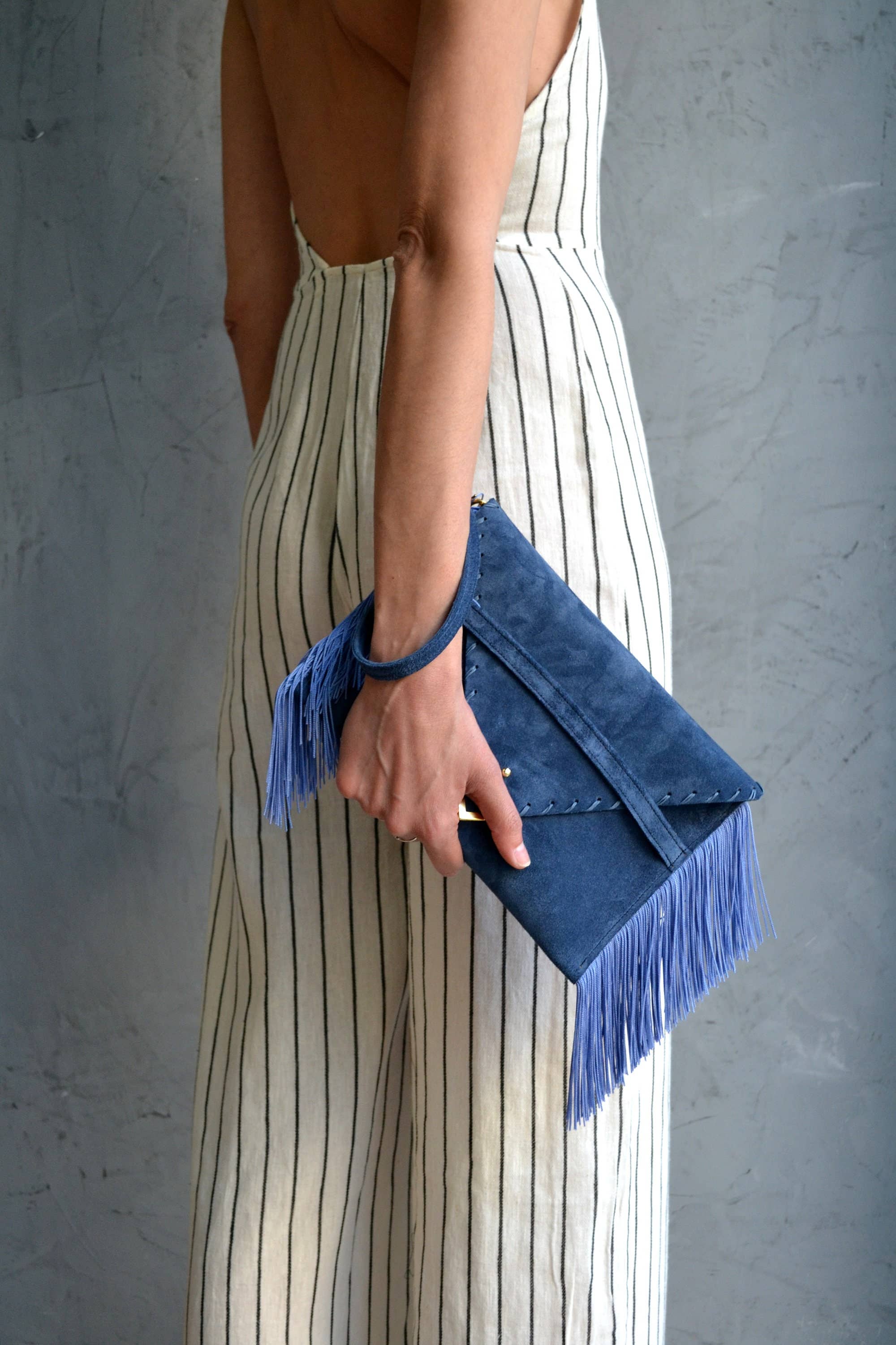 Leather clutch in raf blue with silk fringes