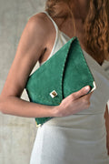 Suede clutch in emerald