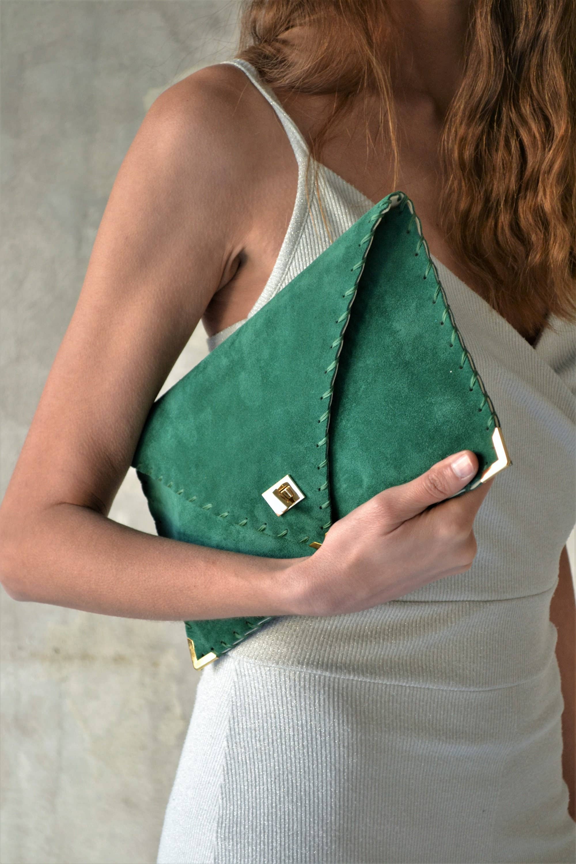 Suede clutch in emerald