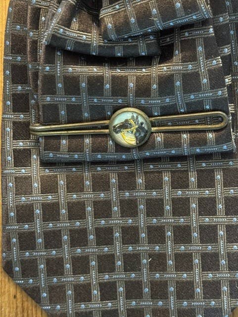 The Bridle & Brass Tie