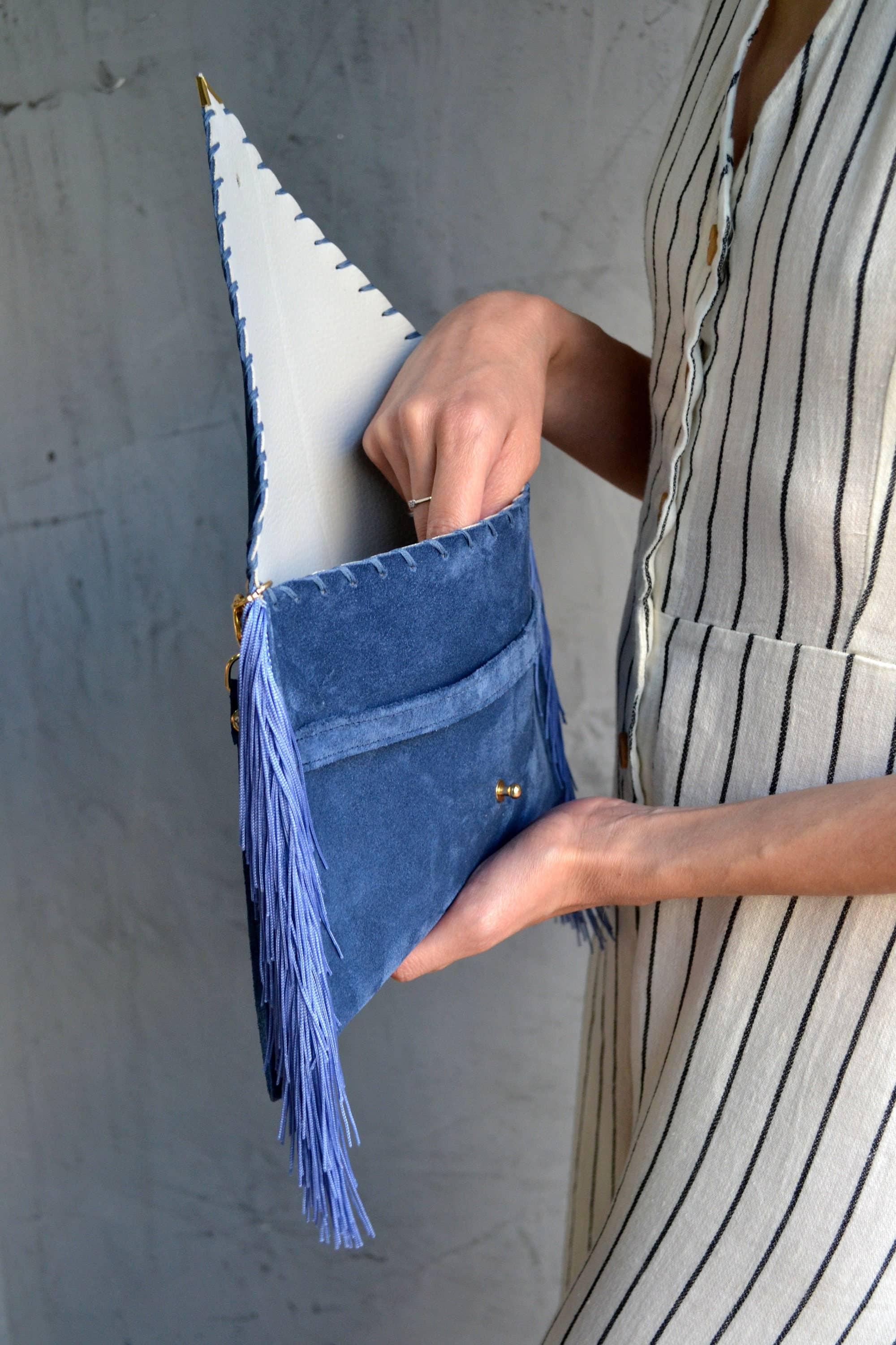 Leather clutch in raf blue with silk fringes