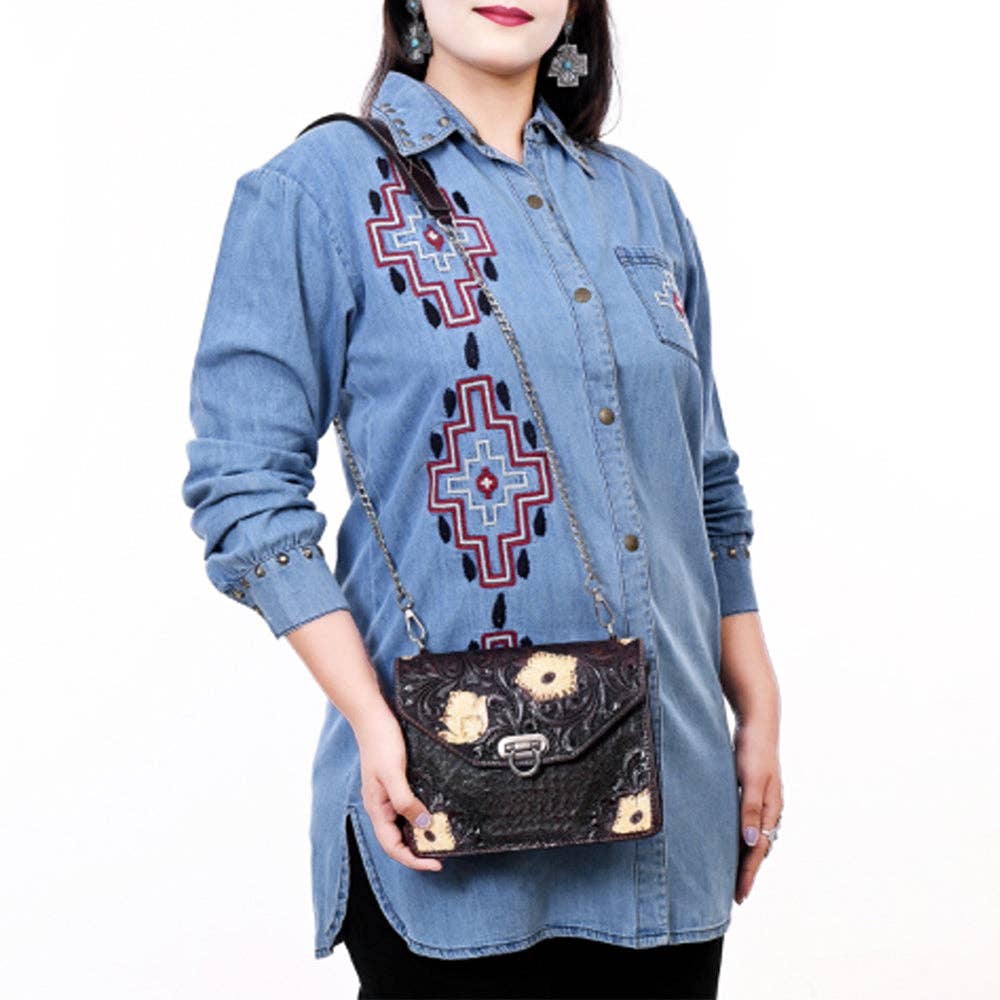 Hand-Tooled Leather Messenger Bag with Floral Design & Chain Strap