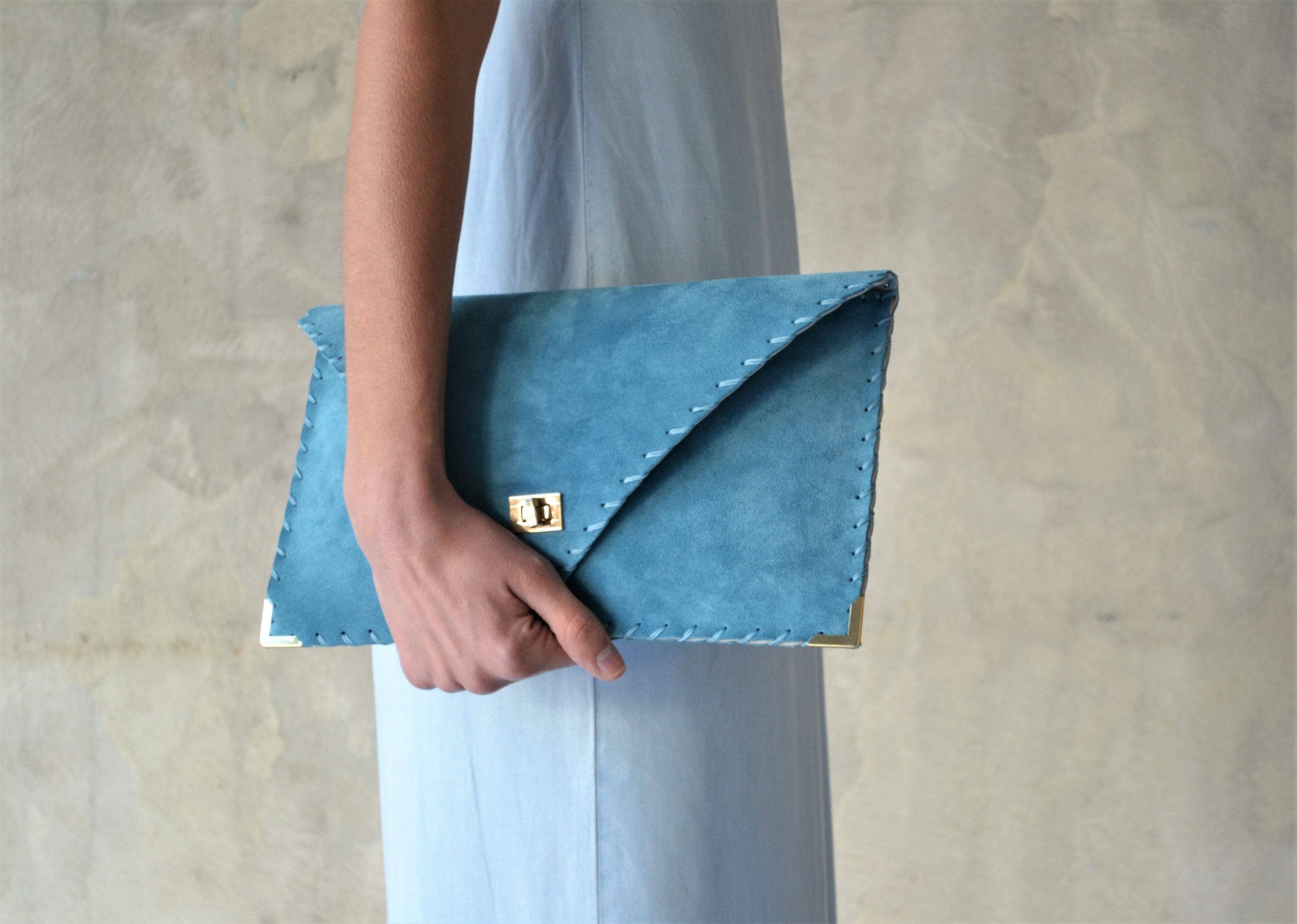 Soft leather clutch in jeans blue
