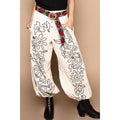 Floral embroidered pattern solid twill pants