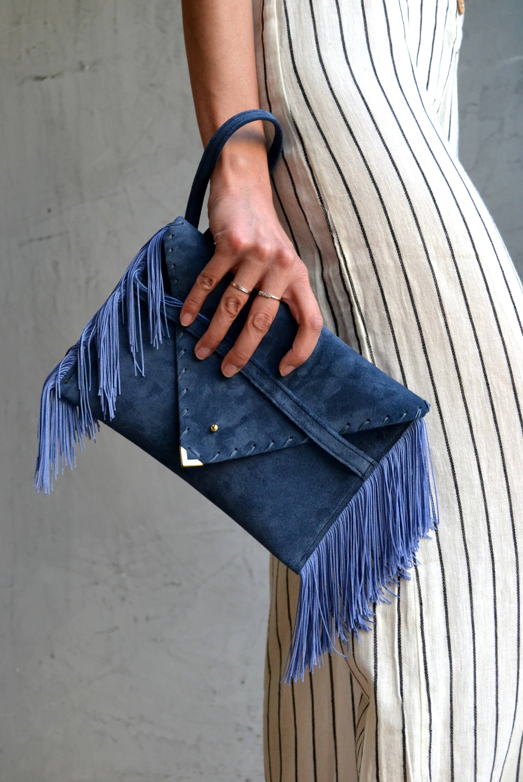 Leather clutch in raf blue with silk fringes