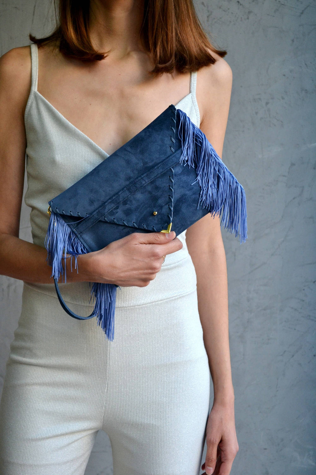Leather clutch in raf blue with silk fringes