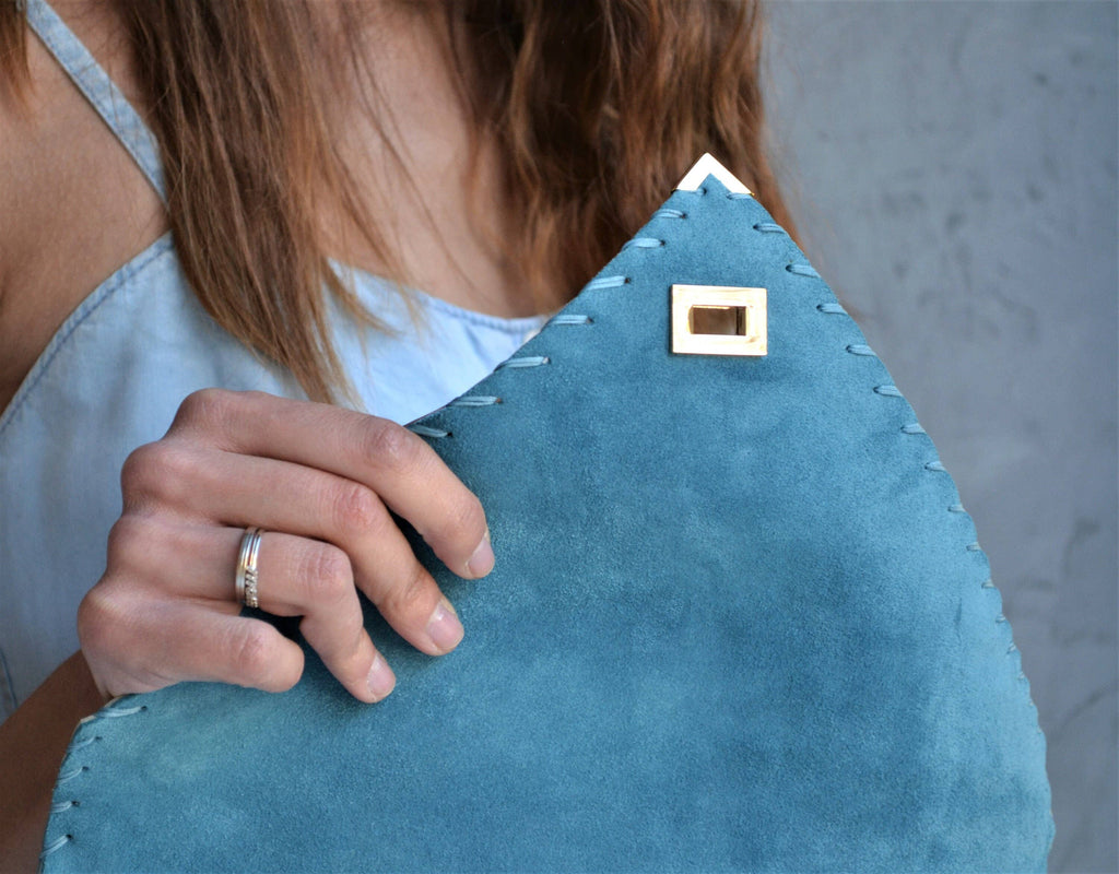 Soft leather clutch in jeans blue